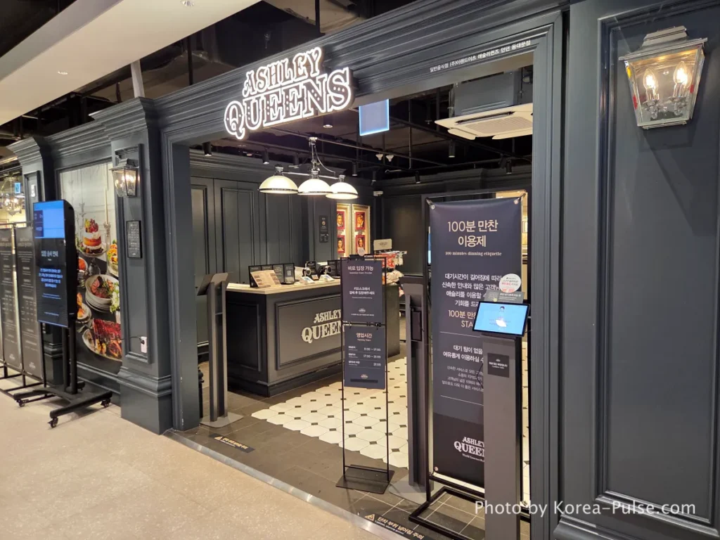 DUNDUN Dongdaemun: 8 Floors, Zero Excuses to Shop Anywhere Else 23 Ashley Queens family buffet restaurant entrance and crowded packed dining hall on 7th floor DUNDUN Dongdaemun