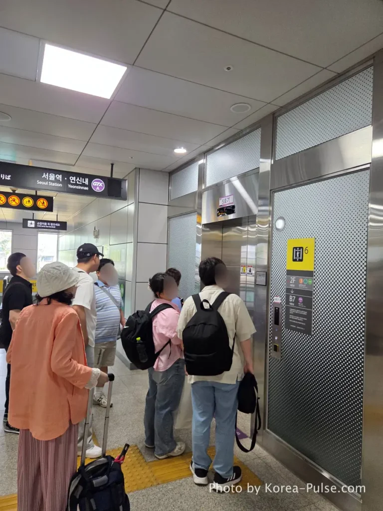 GTX-A Seoul Guide: Korea's Deep Underground Express from Daegok to Seoul Station 3 "Passengers queuing and waiting in line for the deep underground elevator at GTX-A Daegok Station