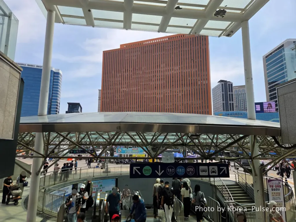 GTX-A Seoul Guide: Korea's Deep Underground Express from Daegok to Seoul Station 13 Street level view outside Seoul Station showing the station plaza and the old terracotta company headquarters building