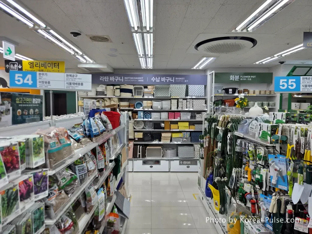 Rattan baskets gardening tools and flower pots display on 10th floor Daiso Myeongdong Station branch Seoul