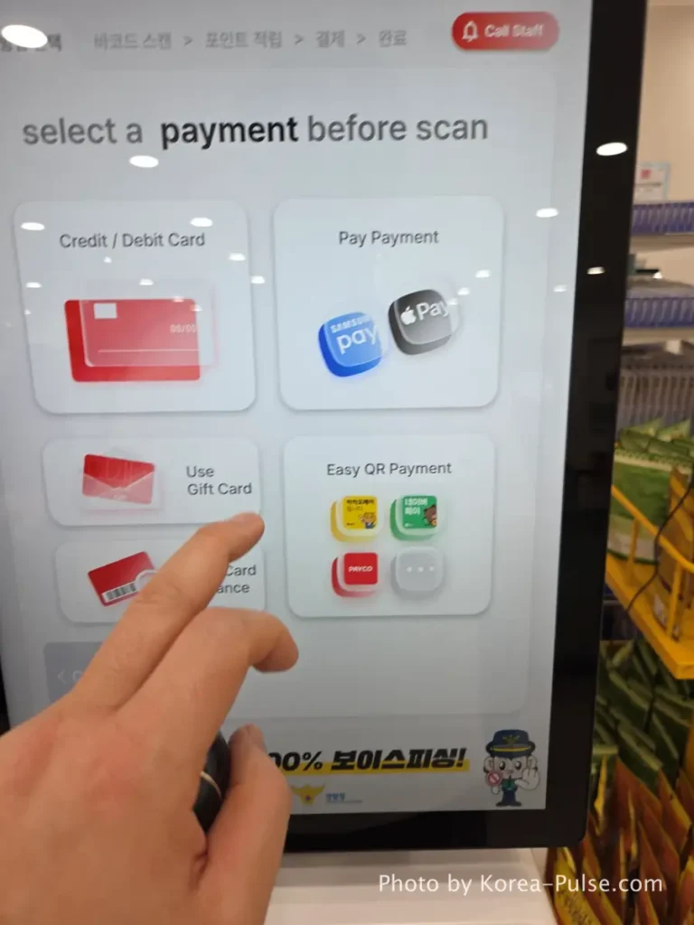 ayment method selection screen on Daiso Myeongdong Station branch self checkout kiosk showing card and QR options