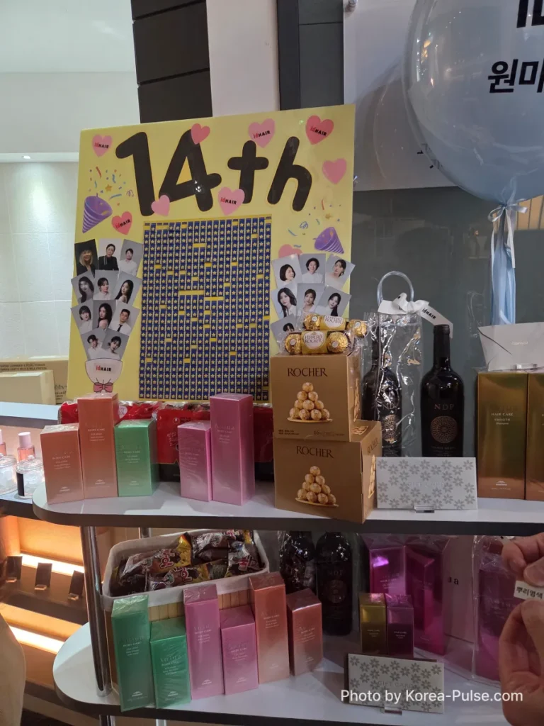 idHAIR One Mount 14th anniversary event promotion board with membership benefits