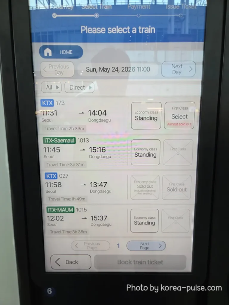 How to Buy a KTX Ticket at Seoul Station: A Friendly Step-by-Step Guide for Foreigners 5 KTX ticket machine screen displaying the Please Select a Train page showing KTX 173 at 11:31 with Economy class Standing and First Class Almost Sold Out, plus other train options below