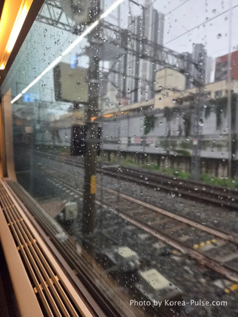 Rainy weather view from KTX window leaving Seoul on KTX family trip Korea