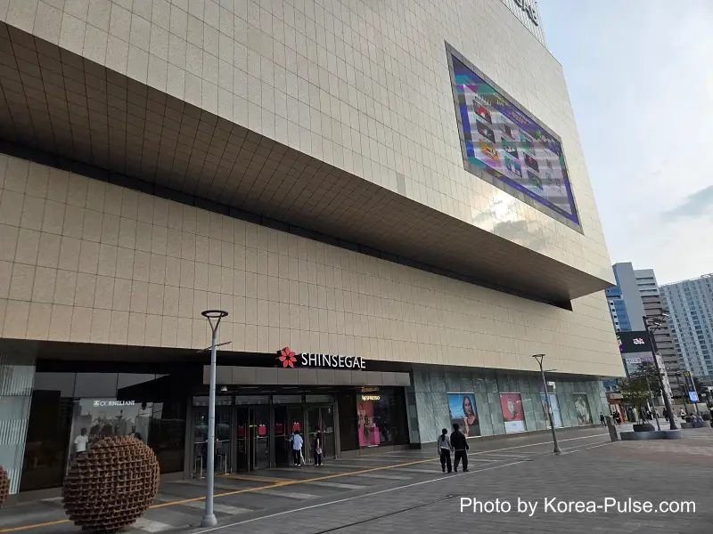 Dongdaegu to Andong Train: Riding Korea's Classic Mugunghwa 3 Dongdaegu Complex Transfer Center exterior glass facade pedestrians plaza Daegu Korea