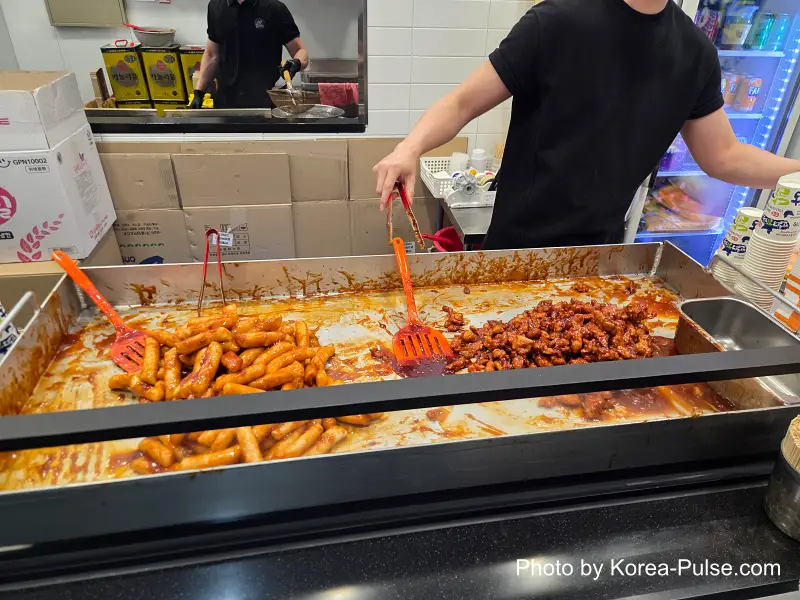 Dongdaegu to Andong Train: Riding Korea's Classic Mugunghwa 6 Banwoldang Dakgangjeong tteokbokki rice cakes fried chicken close up Dongdaegu Station food stall