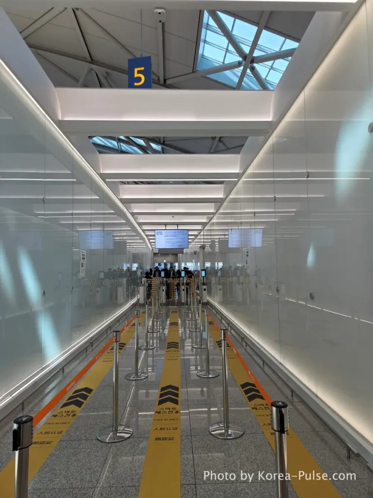 Incheon Airport Smartpass: Skip the Line & Hit the Lounge Fast 4 Incheon Airport Smartpass dedicated departure lane completely empty with yellow gate barriers at Terminal 1