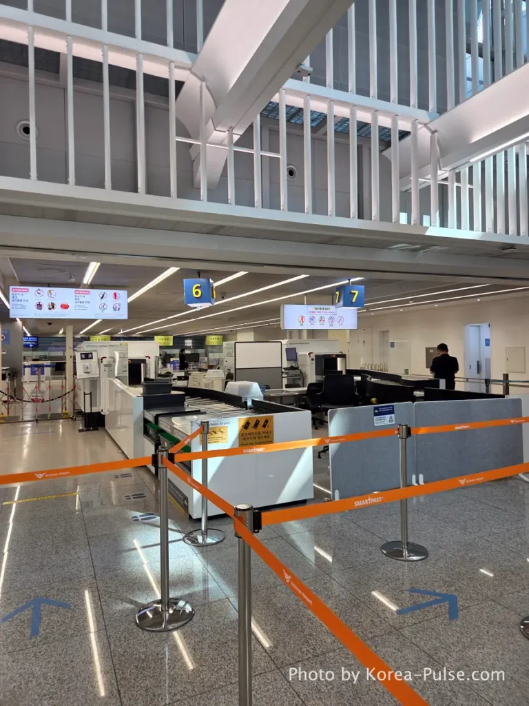 Incheon Airport Smartpass: Skip the Line & Hit the Lounge Fast 5 Incheon Airport security baggage screening checkpoint with empty conveyor belts after Smartpass gate entry