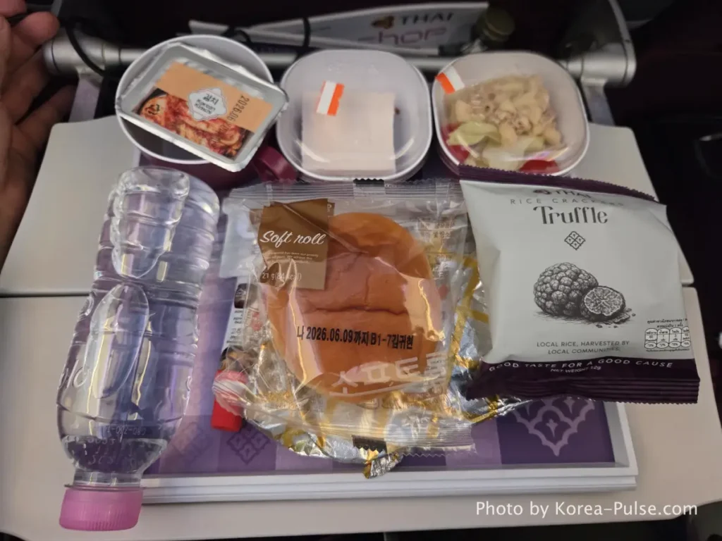 Incheon Airport Smartpass: Skip the Line & Hit the Lounge Fast 17 Thai Airways in-flight meal tray with warm food and dessert served on Bangkok route