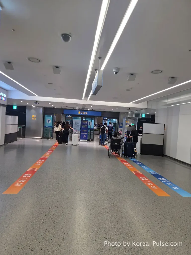 Incheon Airport Arrival Guide: Plane to Bus in Under an Hour 9 Incheon Airport EXIT automatic sliding doors into public arrivals hall after customs at Terminal 1