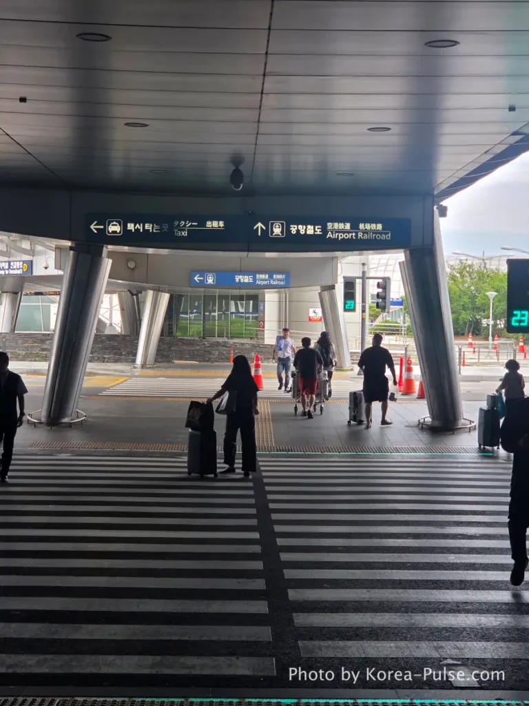 Incheon Airport Arrival Guide: Plane to Bus in Under an Hour 26 Incheon Airport Terminal 1 outdoor crosswalk leading to AREX airport railroad transportation center