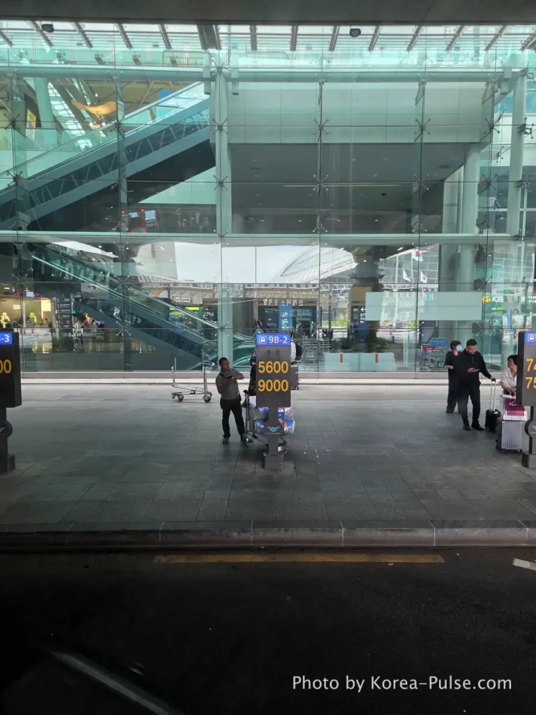 Incheon Airport Arrival Guide: Plane to Bus in Under an Hour 27 Incheon Airport Terminal 1 outdoor bus boarding platforms with covered waiting areas and route number signs