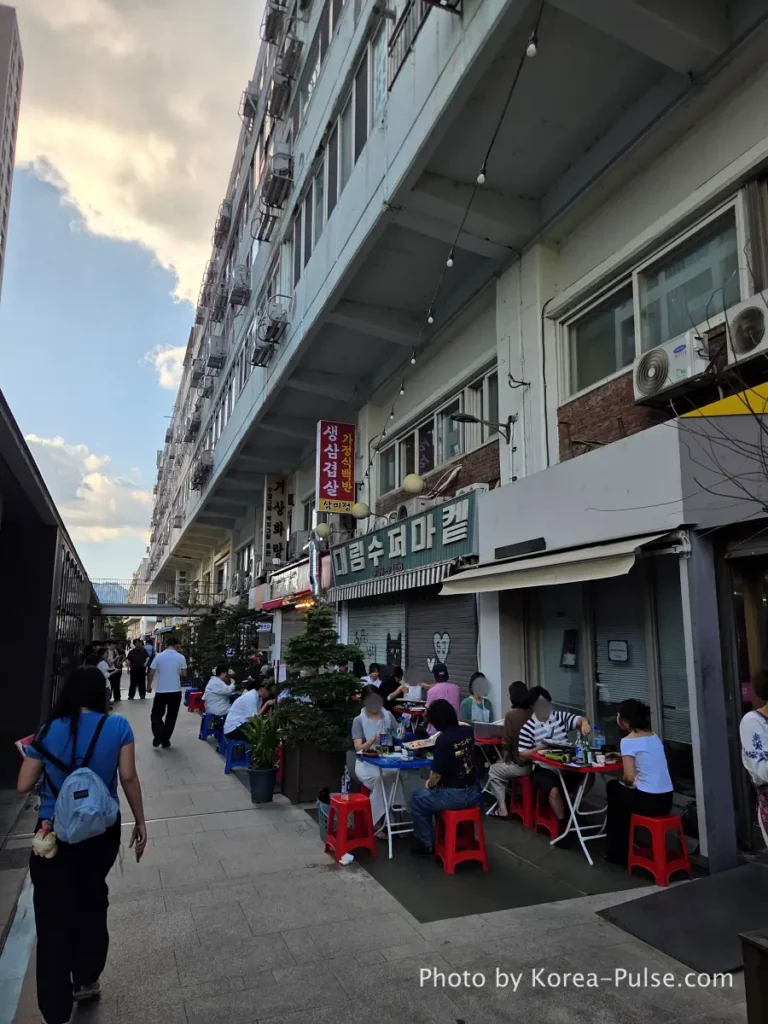 Euljiro Outdoor Dining: TOP 5 Where Seoul's Office Workers Actually Go 13 Sammijeong restaurant entrance Euljiro outdoor dining Seoul red sign samgyeopsal