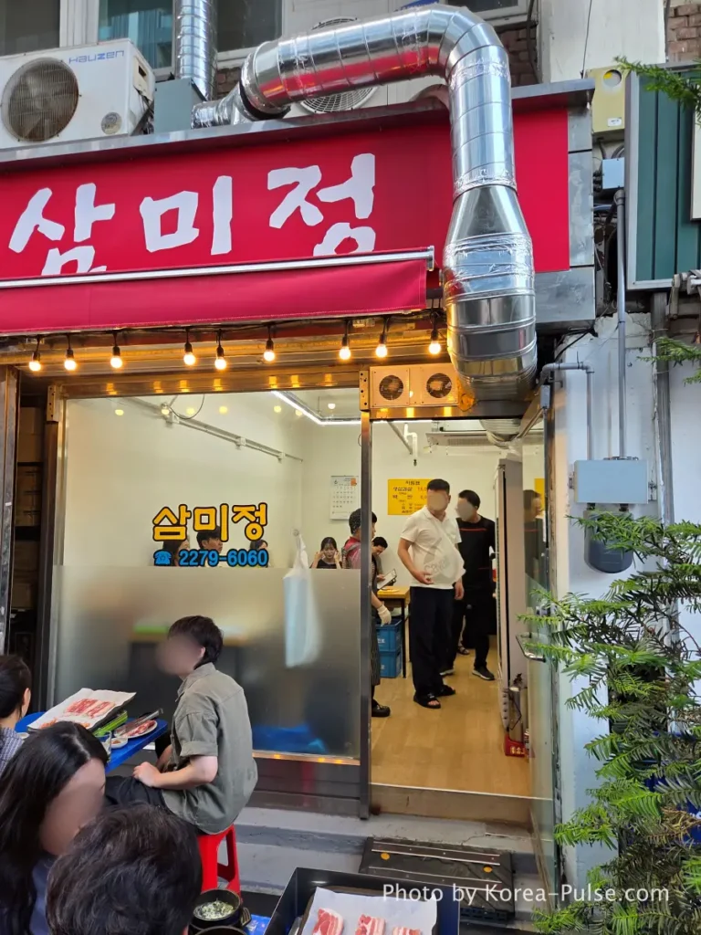 Euljiro Outdoor Dining: TOP 5 Where Seoul's Office Workers Actually Go 14 Sammijeong restaurant front door red sign narrow interior Euljiro Seoul