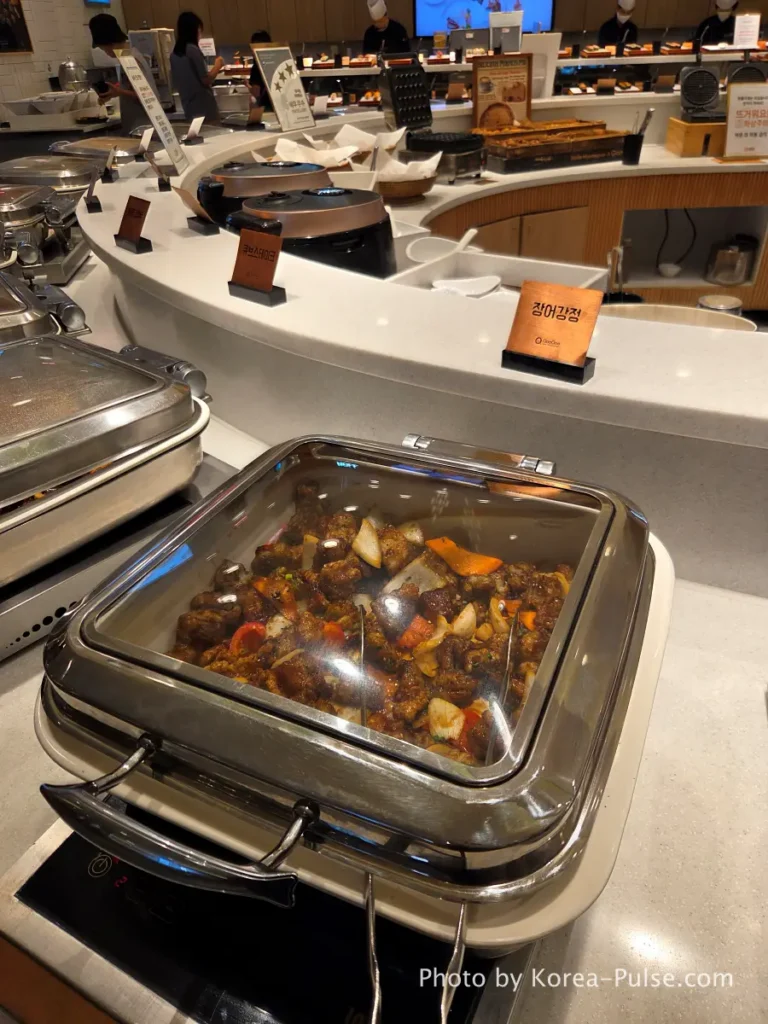 Eel gangjeong cube steak and LA galbi trays at QooQoo buffet