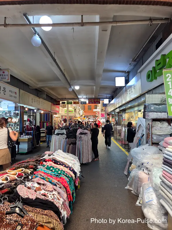Gwangjang Market clothing market main corridor with bedding and silk goods