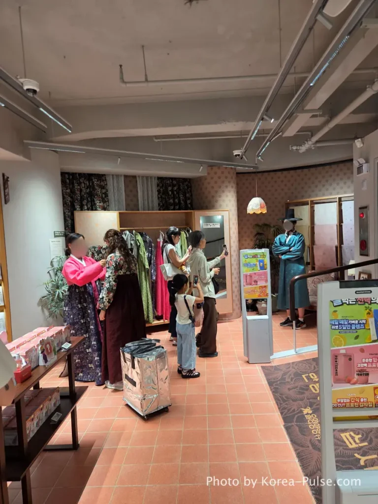 Olive Young Gwangjang Market: The Retro K-Beauty Store Hiding Inside a Century-Old Market 11 Hanbok photo point with mannequins at Olive Young Gwangjang Market