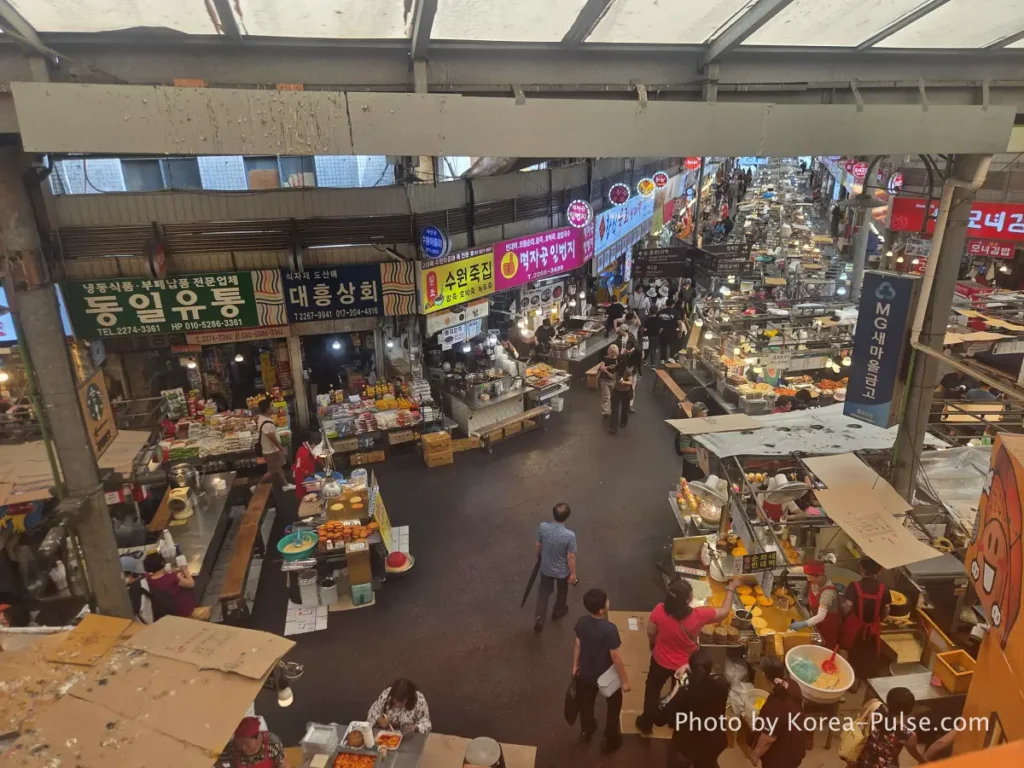 Olive Young Gwangjang Market: The Retro K-Beauty Store Hiding Inside a Century-Old Market 15 Aerial view of Gwangjang Market food alley from Olive Young window