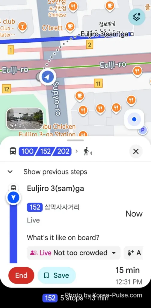 Google Maps transit navigation tracking a live bus ride with crowd level in Seoul