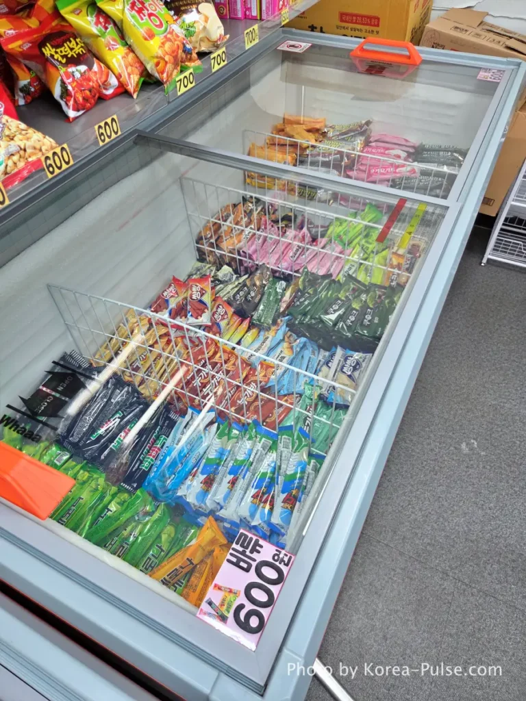 Unmanned Ice Cream Store Korea: Stunning 314% Retail Boom (2026) 5 Freezer bin of 600-won bar ice cream including Melona and Nugabar at a Korean unmanned store
